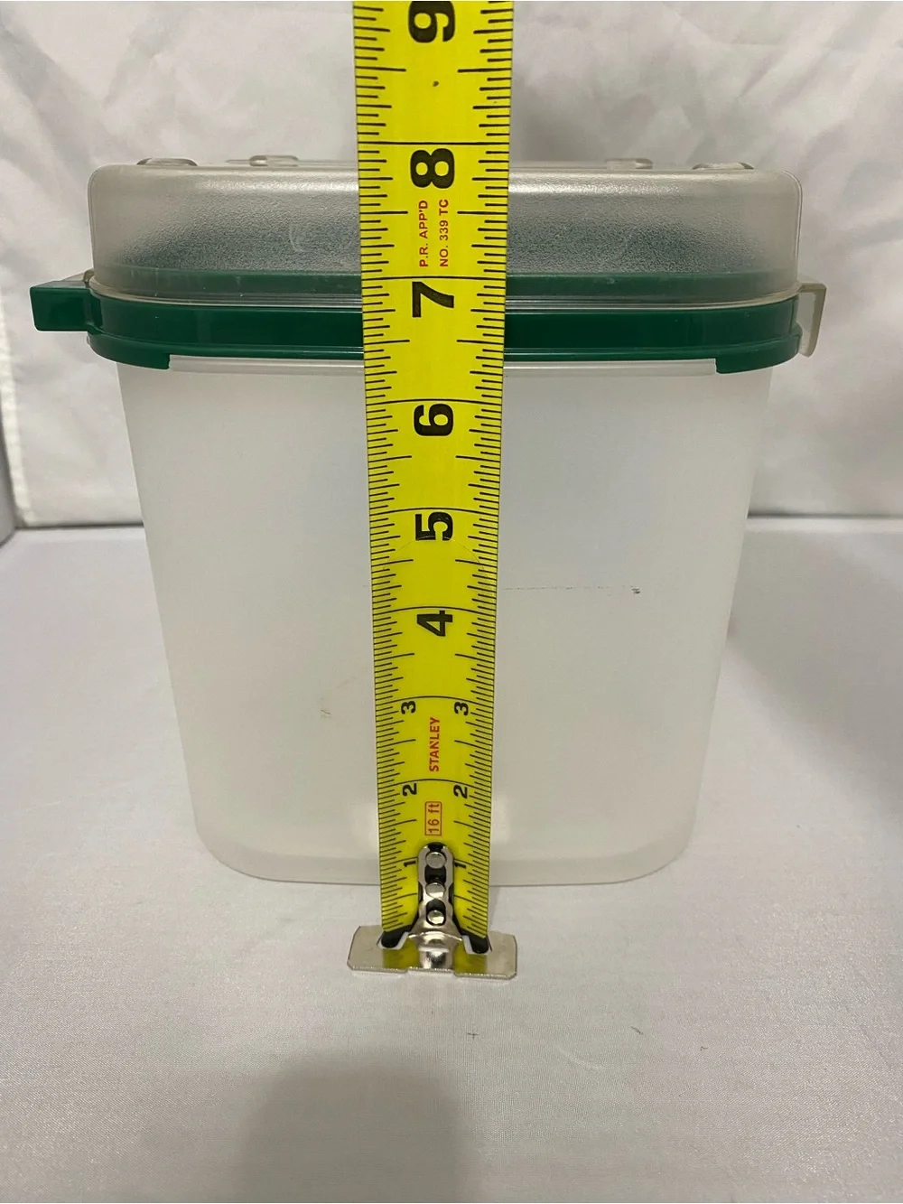 Tupperware Container with Green Rim and Flip Top Lid